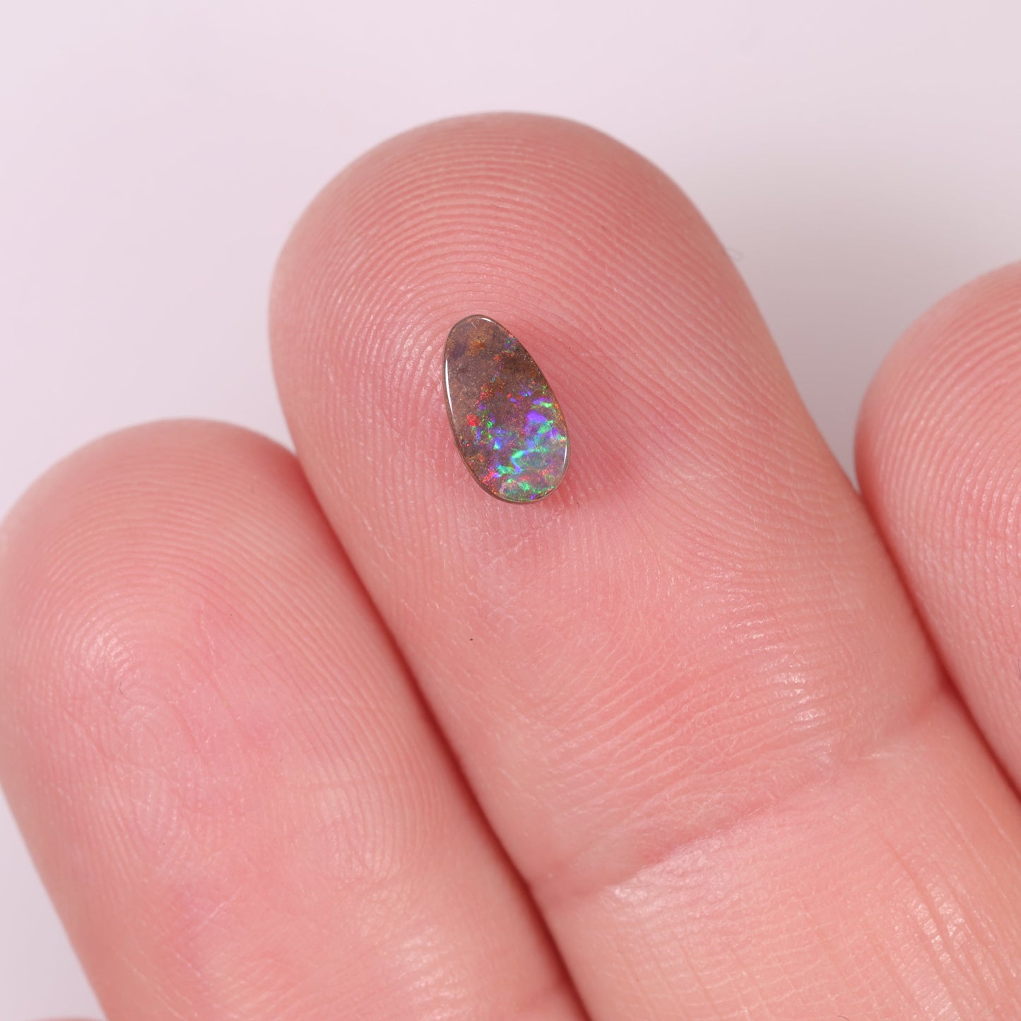 Boulder Opal 0.6 cts 33084