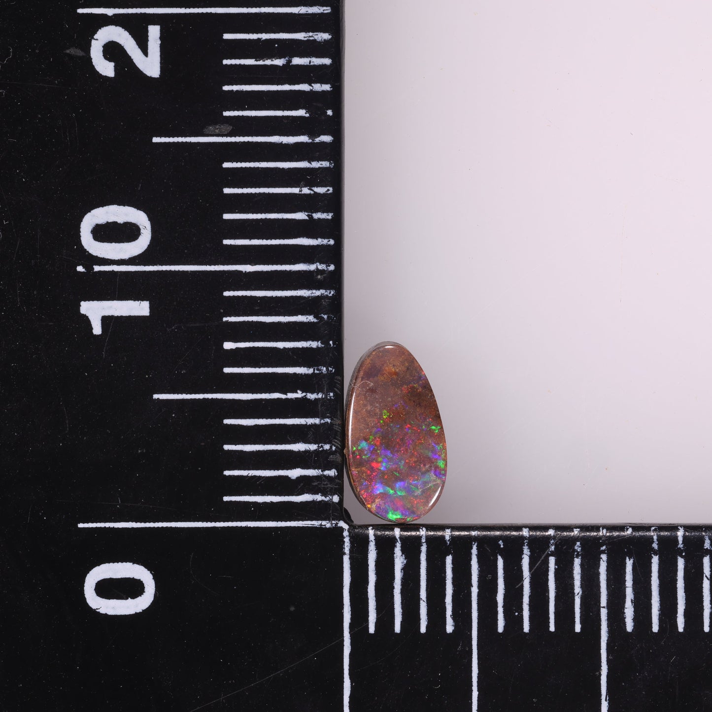 Boulder Opal 0.6 cts 33084