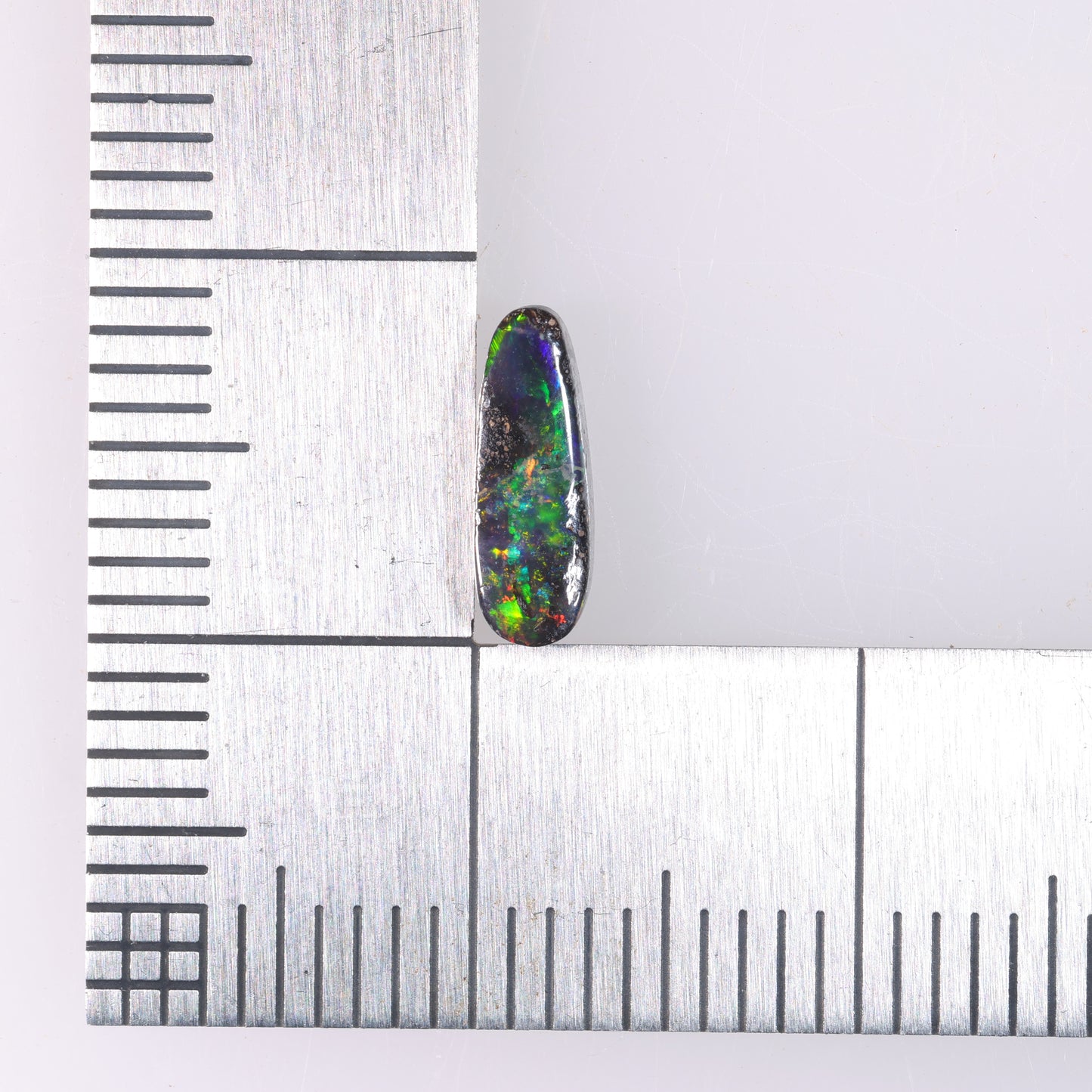 Boulder Opal 0.6 cts 37936